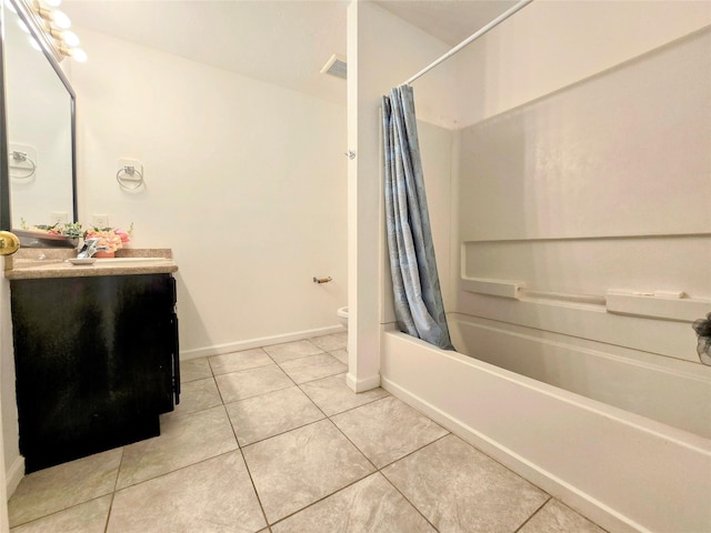 full bathroom featuring tile patterned flooring, vanity, shower / tub combo, and toilet