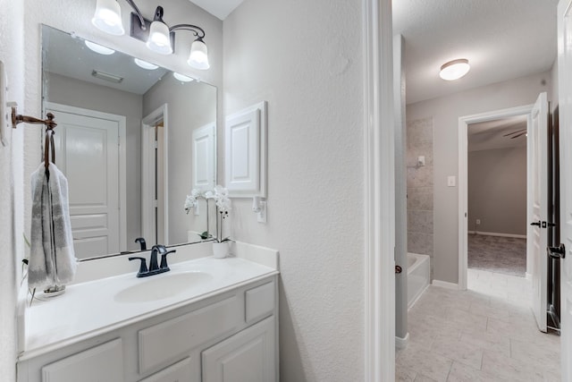 bathroom featuring vanity and shower / bathing tub combination