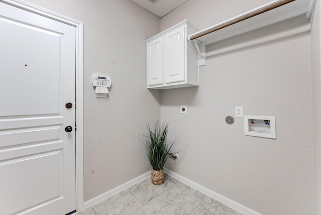 laundry room with gas dryer hookup, cabinets, hookup for an electric dryer, and hookup for a washing machine