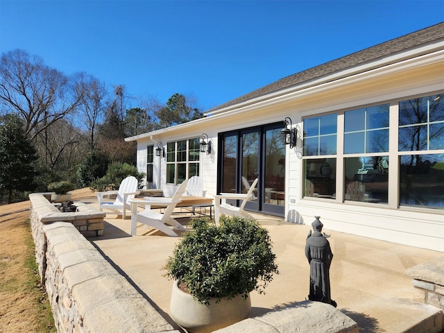 view of patio / terrace featuring an outdoor fire pit