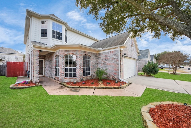 view of front property featuring a garage and a front lawn