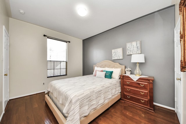 bedroom featuring dark hardwood / wood-style floors