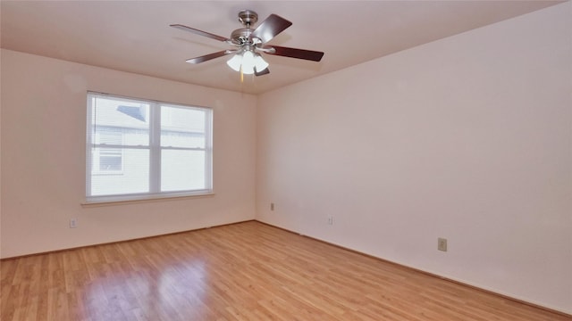 unfurnished room featuring light hardwood / wood-style flooring and ceiling fan