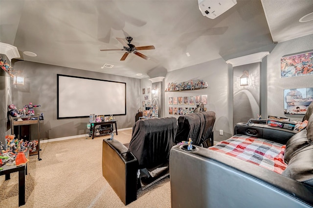 home theater featuring ceiling fan and light colored carpet