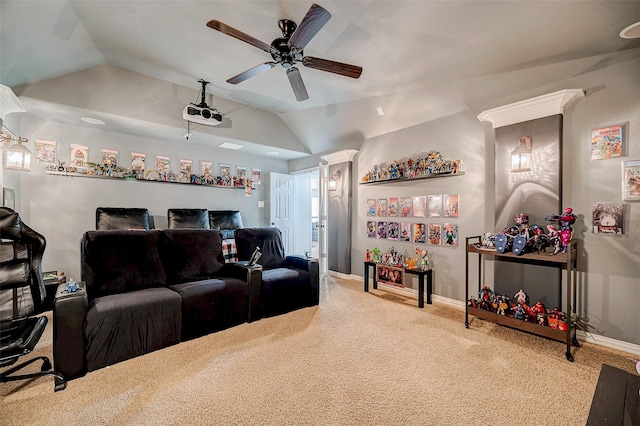 carpeted cinema room featuring lofted ceiling and ceiling fan