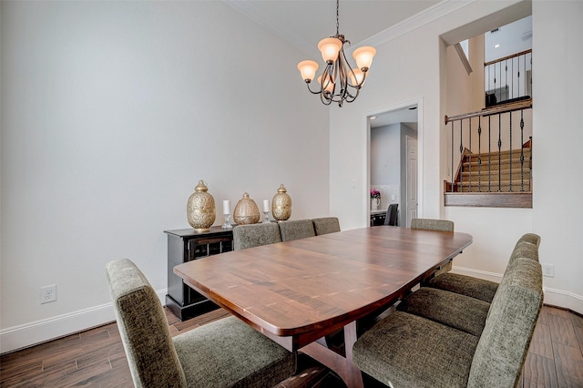 dining room featuring crown molding, an inviting chandelier, and dark wood-type flooring