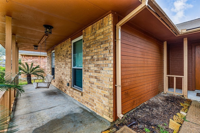 view of home's exterior featuring covered porch