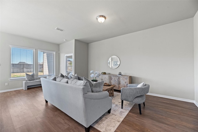 living room with dark hardwood / wood-style floors