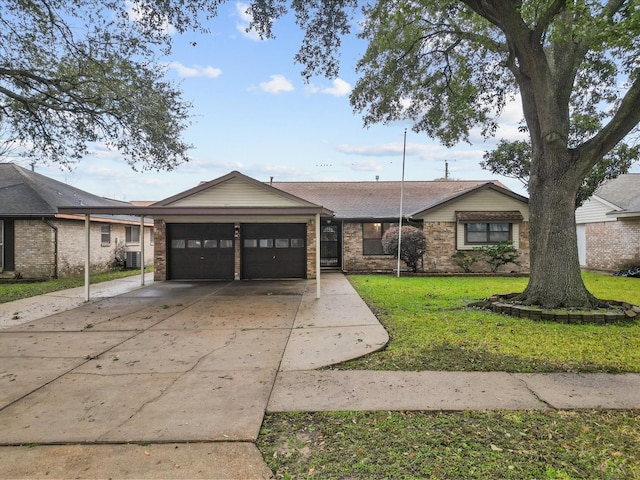 ranch-style home featuring a garage and a front yard