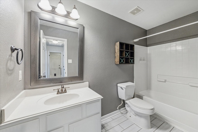 full bathroom with vanity, bathtub / shower combination, and toilet