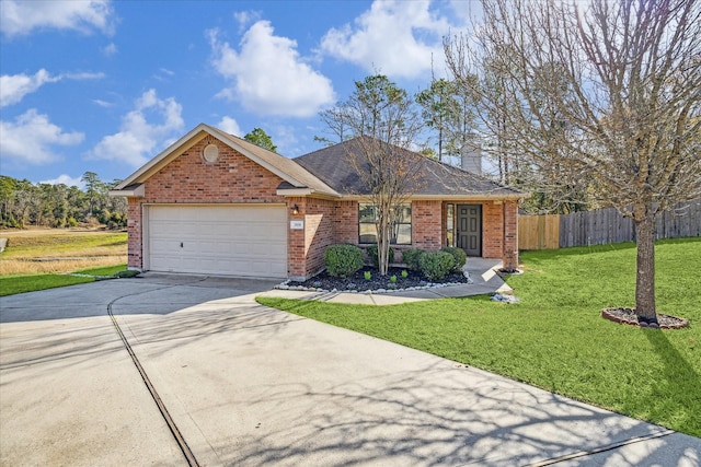 ranch-style home featuring a garage and a front yard