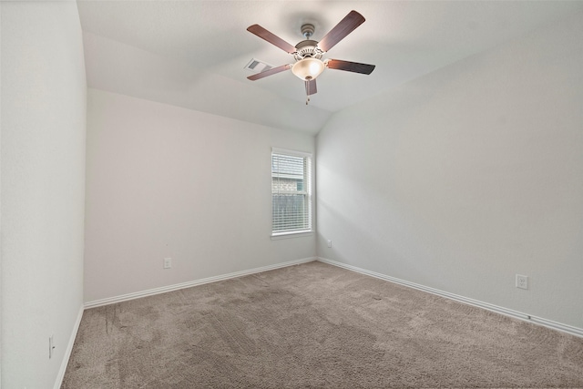 unfurnished room featuring vaulted ceiling, light colored carpet, and ceiling fan