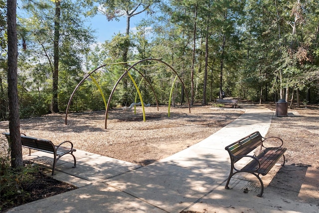 view of home's community featuring a playground