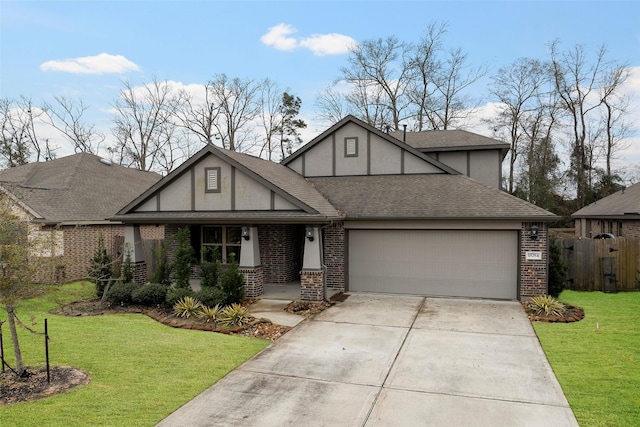 tudor house with a garage and a front yard