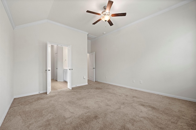 unfurnished bedroom with lofted ceiling, light colored carpet, ceiling fan, crown molding, and ensuite bath