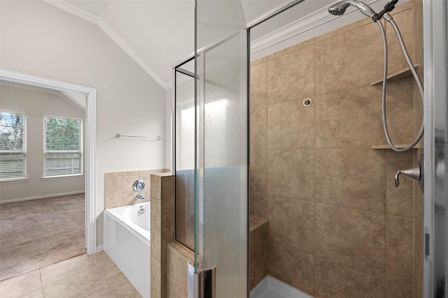 bathroom featuring vaulted ceiling, separate shower and tub, tile patterned floors, and crown molding