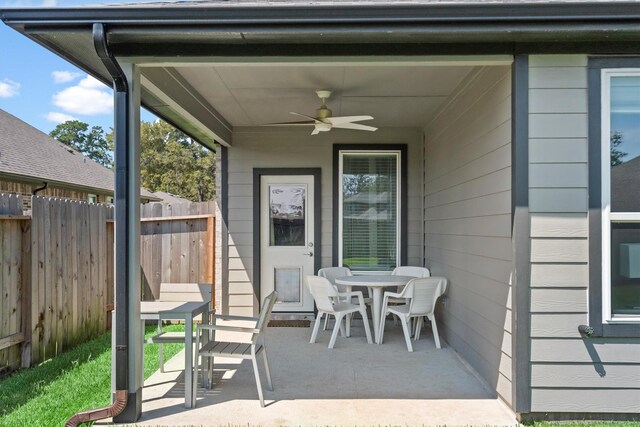 view of patio featuring ceiling fan