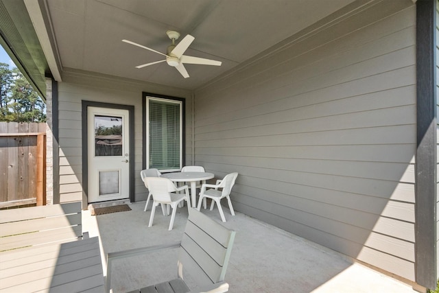 view of patio featuring ceiling fan