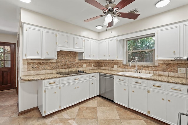 kitchen with sink, white cabinetry, backsplash, light stone countertops, and stainless steel dishwasher