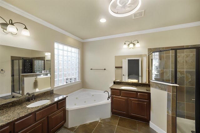 bathroom featuring vanity, ornamental molding, and separate shower and tub