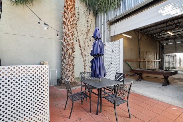 view of patio with outdoor dining area