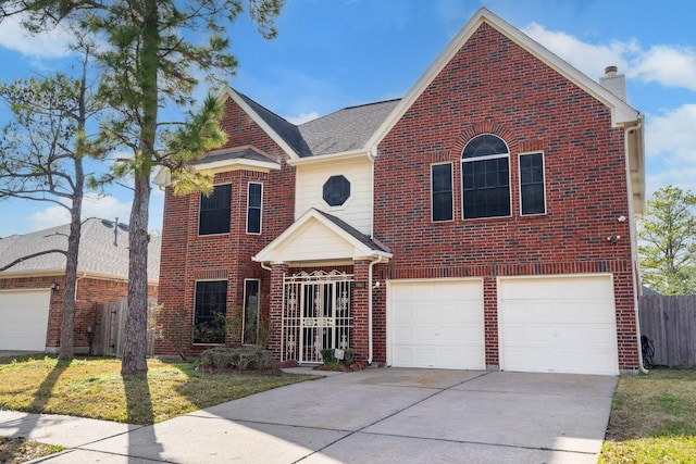 front of property with a garage