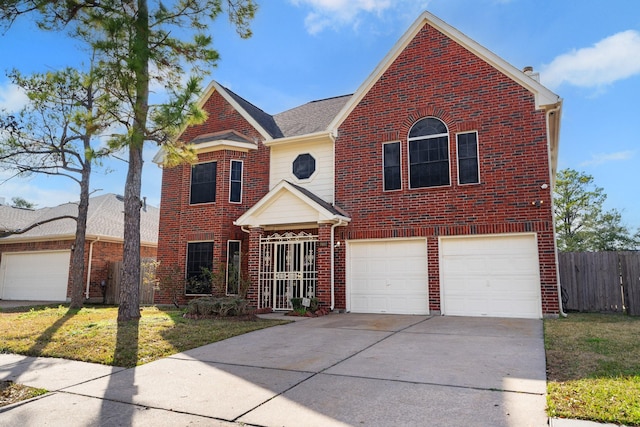 front of property with a garage and a front yard