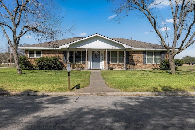 single story home with a front yard