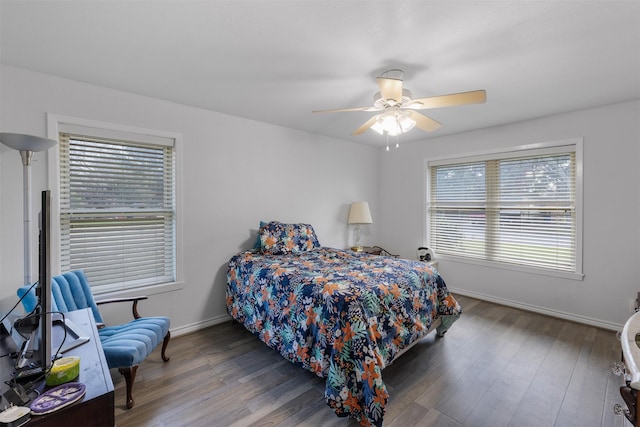 bedroom with ceiling fan and hardwood / wood-style floors