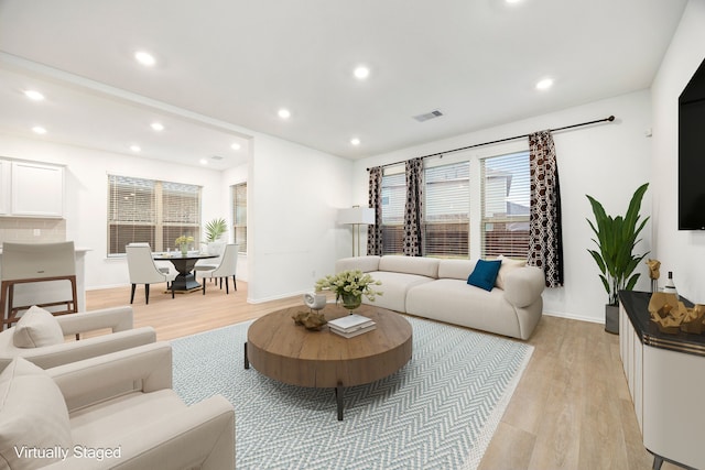 living room featuring light wood-type flooring