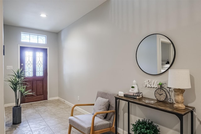 entrance foyer with light tile patterned floors, recessed lighting, and baseboards