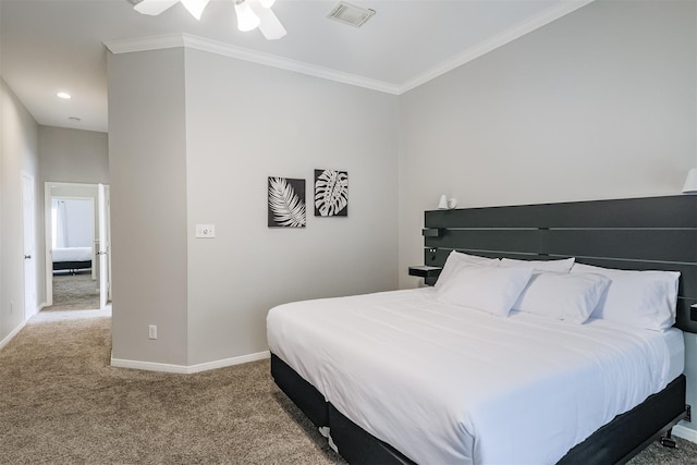 bedroom featuring light carpet, baseboards, visible vents, and ornamental molding