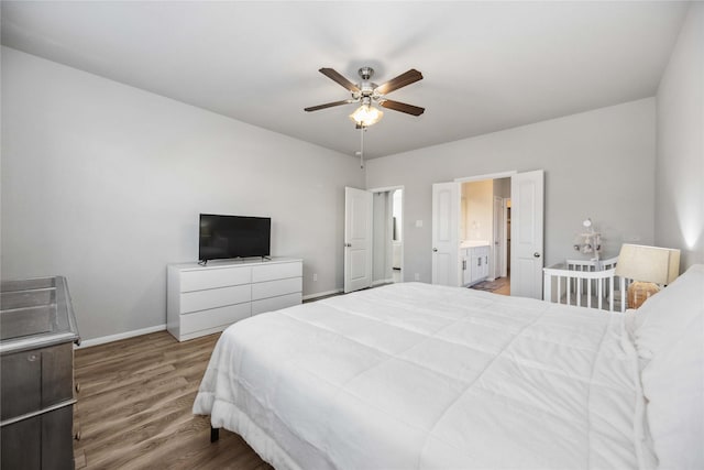 bedroom featuring hardwood / wood-style flooring and ceiling fan