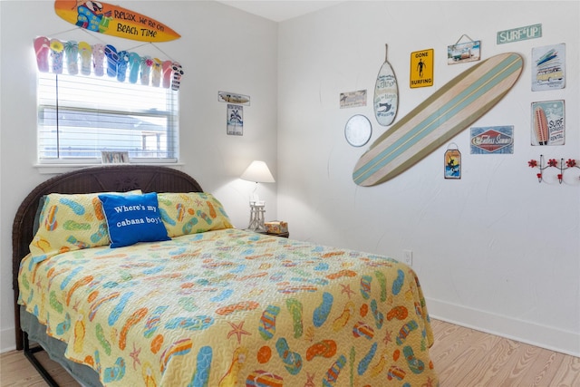 bedroom with light wood-type flooring