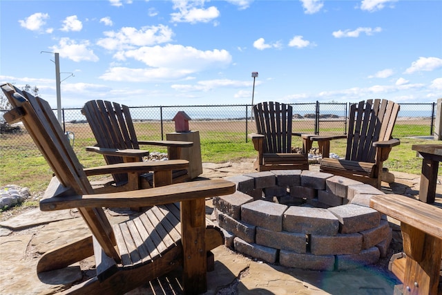 view of patio / terrace with an outdoor fire pit