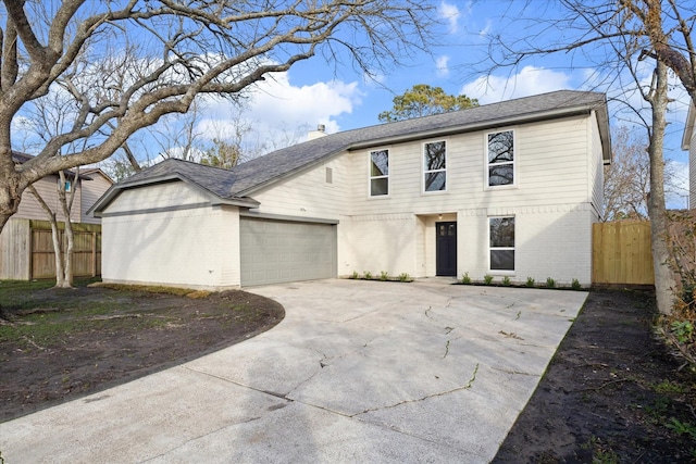 view of front of property with a garage