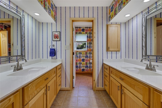 bathroom with vanity and tile patterned floors