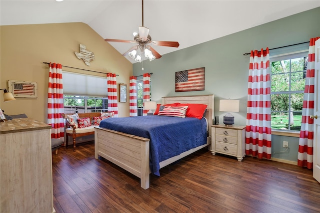 bedroom featuring multiple windows, dark wood-type flooring, ceiling fan, and vaulted ceiling