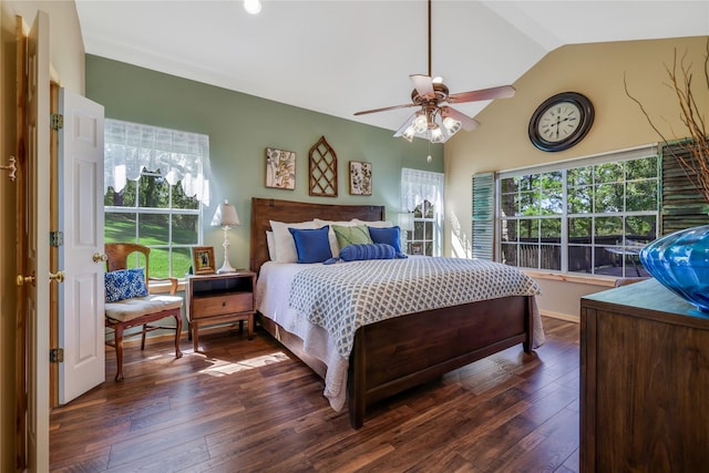 bedroom with multiple windows, lofted ceiling, dark hardwood / wood-style floors, and ceiling fan