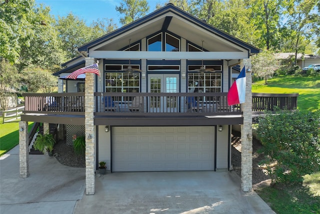 back of house featuring a garage