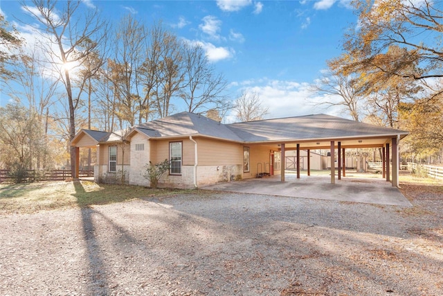 view of front of property with a carport