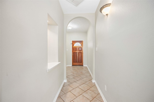 interior space featuring light tile patterned floors