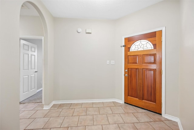 view of tiled foyer entrance