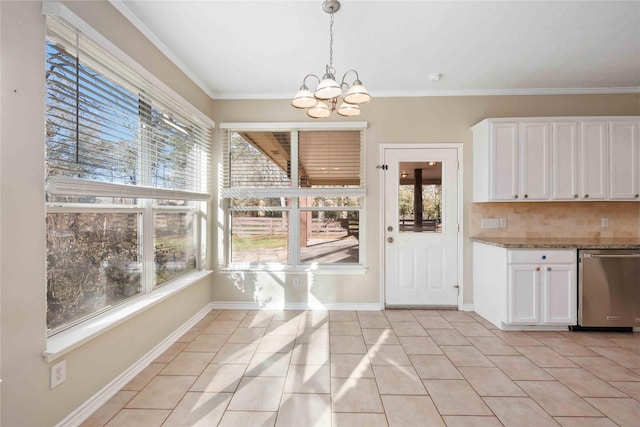 unfurnished dining area featuring light tile patterned flooring, a notable chandelier, and crown molding