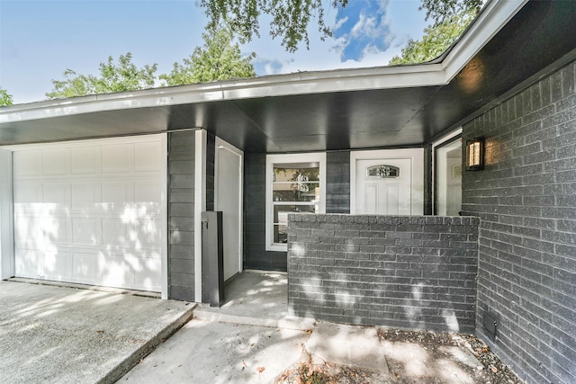 entrance to property with a garage