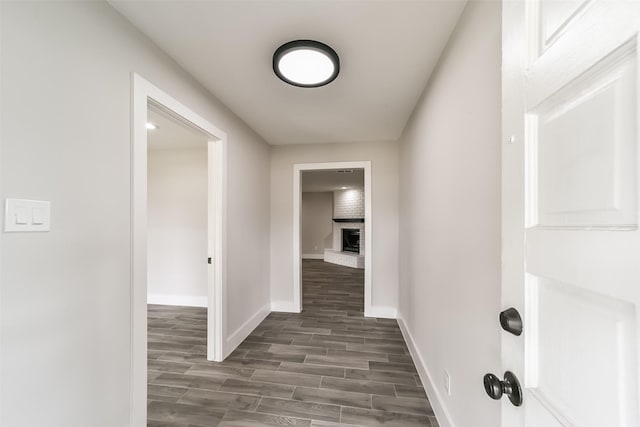 hallway featuring dark hardwood / wood-style floors