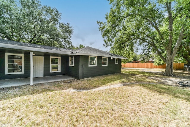 exterior space with a yard and a patio area