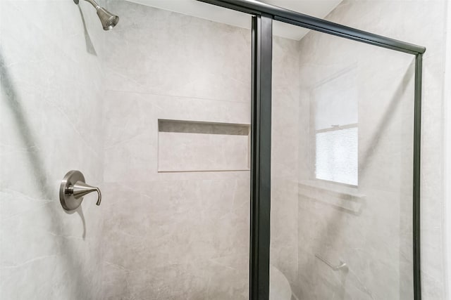 bathroom featuring walk in shower