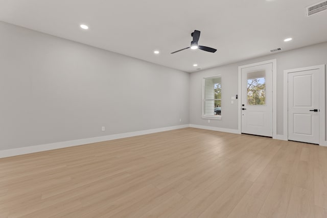 interior space with light hardwood / wood-style floors and ceiling fan