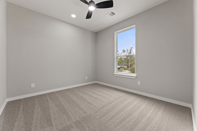 carpeted empty room with ceiling fan